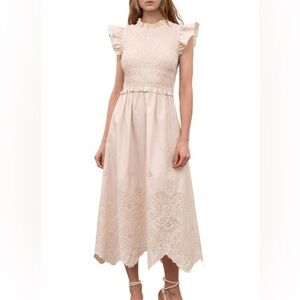 RUFFLE EYELET SMOCKED BODICE STRETCH COTTON DRESS IN CREAM